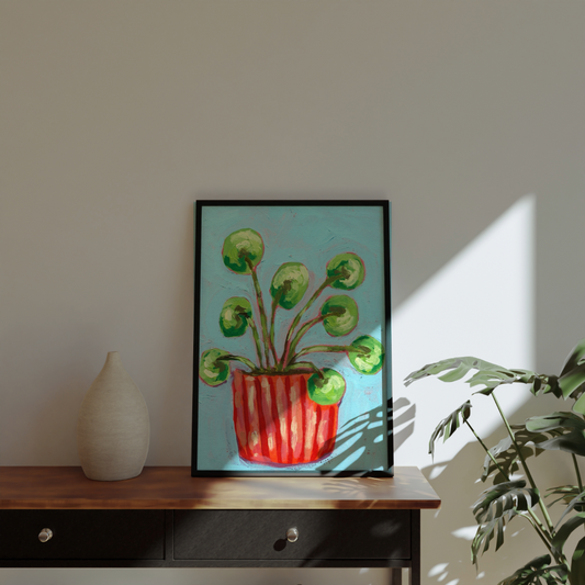 Illustration of a potted plant with green leaves and a red pot on a blue background