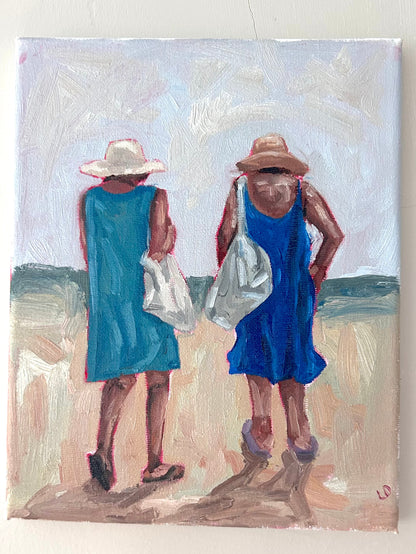 Painting of two people in blue dresses and hats on a beach.